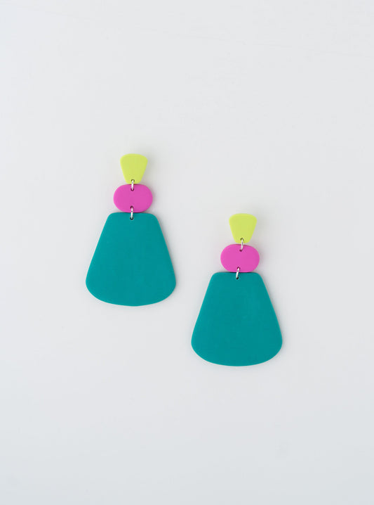 Africa earrings by APÖ, handmade polymer clay earrings featuring three bold shapes in contrasting colors, large, lightweight, and full of movement.