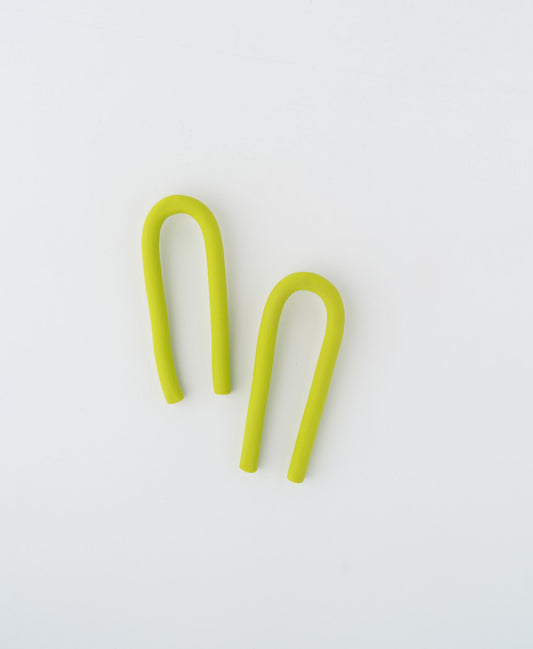Arch earrings by APÖ, handmade polymer clay earrings with a bold arched silhouette in a solid color, minimalist, modern, lightweight, and customizable.