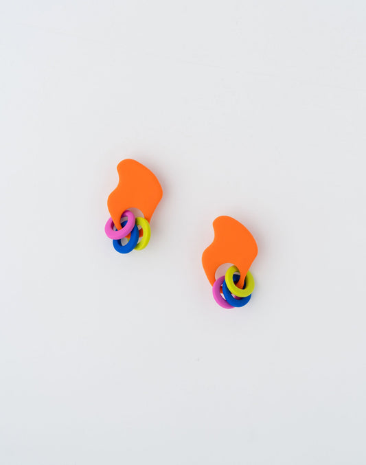 Carnaval earrings by APÖ, handmade polymer clay earrings with a playful multi-hoop design in vibrant contrasting colors, medium-sized, lightweight, and one-of-a-kind.