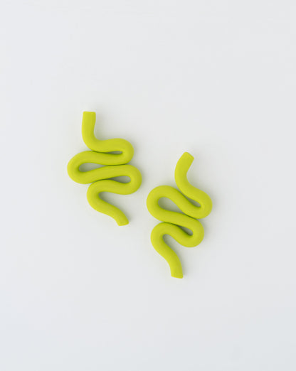 Handmade Snake earrings by APÖ, medium-sized polymer clay design with smooth curves inspired by serpents, lightweight and customizable.